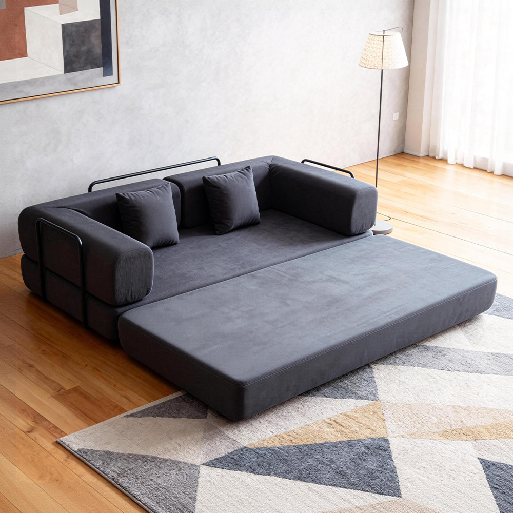 Folding corduroy sofa bed with pillows