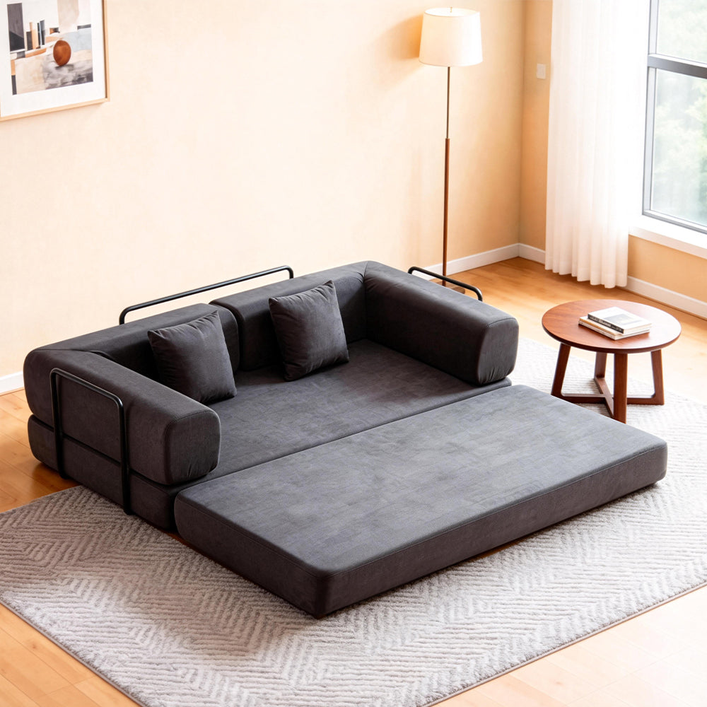 Folding corduroy sofa bed with pillows