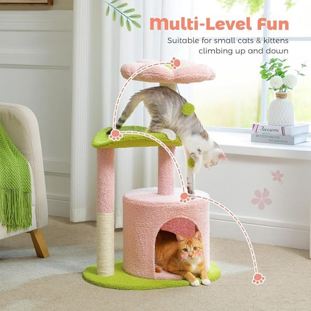 32-inch floral-themed cat tree featuring sisal-wrapped scratching posts, a cosy cat bed, plush perches and a plush toy ball. Designed for indoor cats. Pink version.