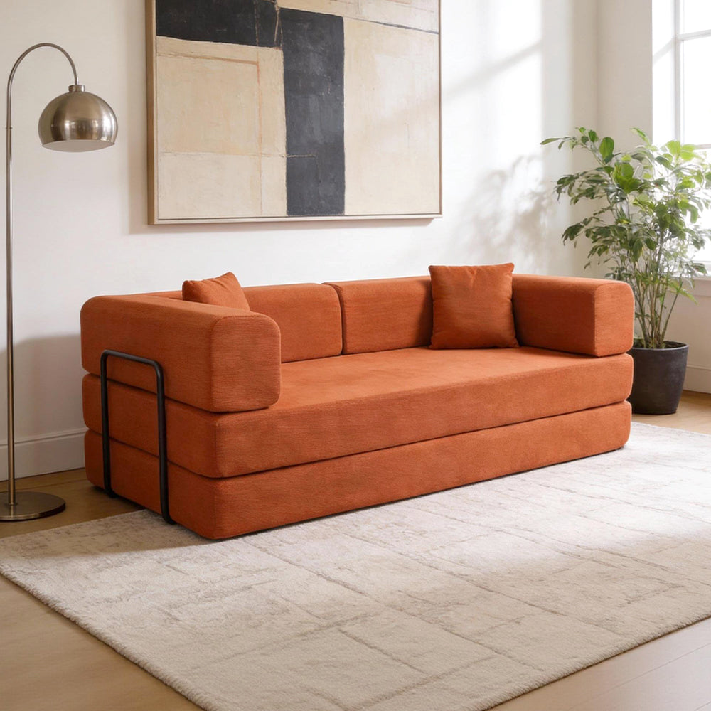 Folding corduroy sofa bed with pillows