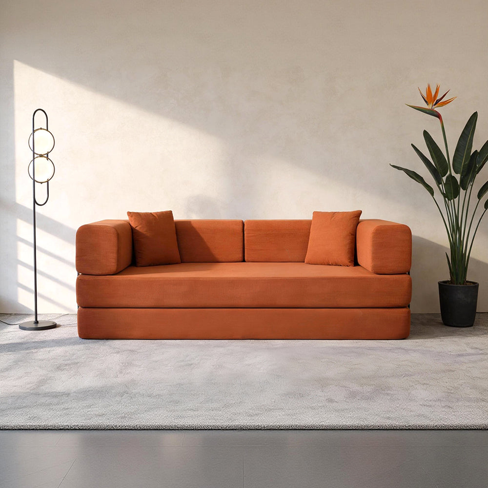 Folding corduroy sofa bed with pillows