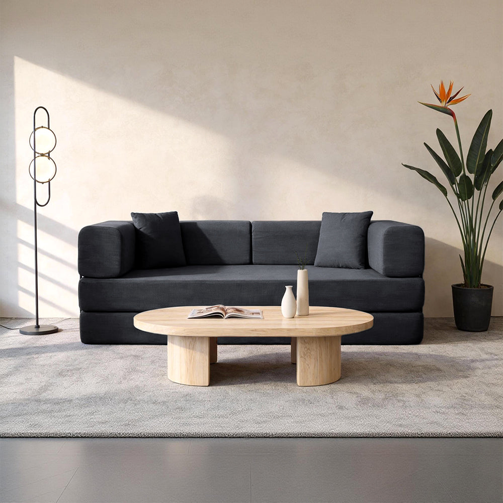 Folding corduroy sofa bed with pillows