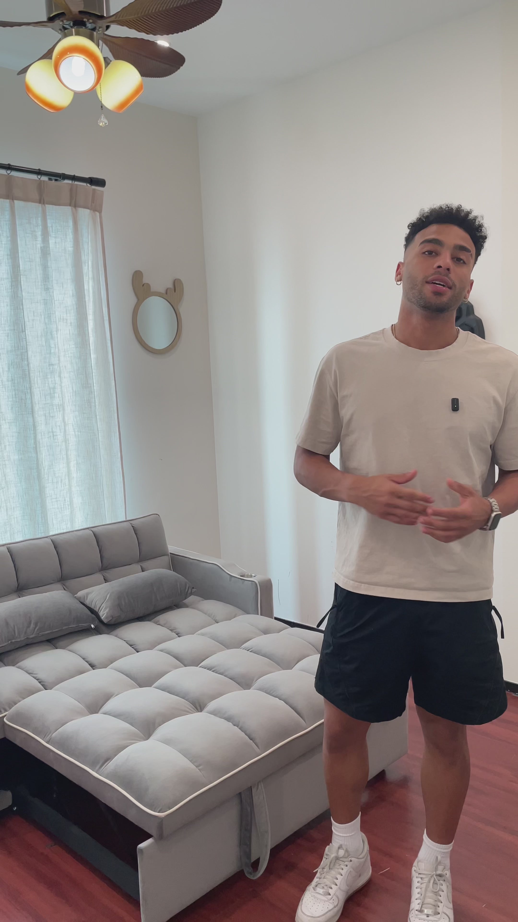 Load video: Eeeza Modern Velvet Sofa Bed with Cushions and Phone Holder, 2-seater